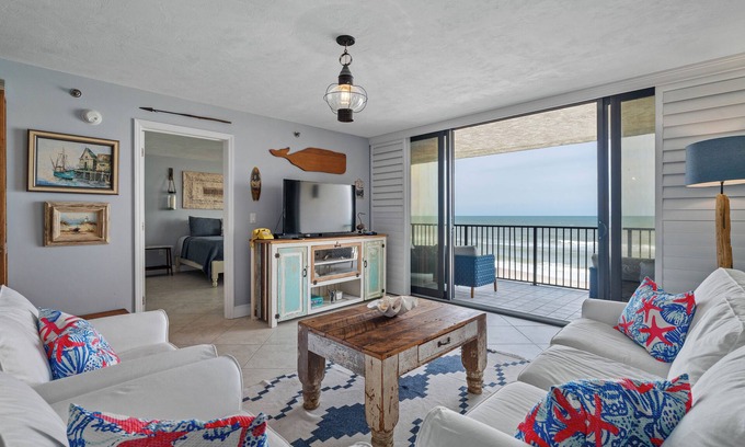 Bethune Beach Condo | Welcome to this stylish 2BR/2BA condo in Chadham By the Sea on a peaceful no-drive beach. Enjoy sweeping ocean views from the open living, dining, and kitchen area, all designed to showcase the scenery, with a calming beach-themed interior.