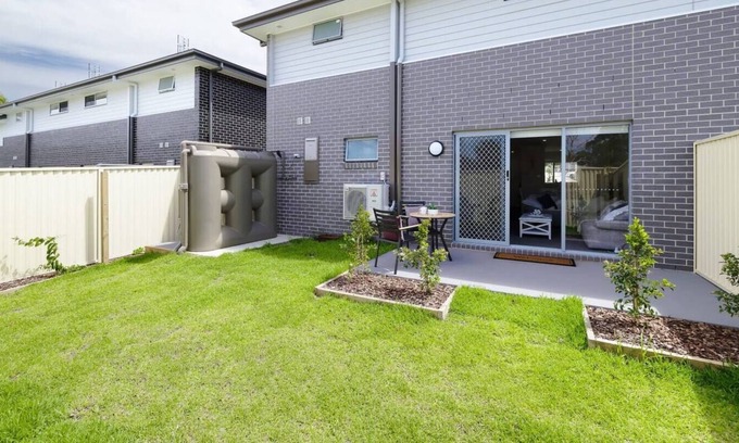 Charmhaven House | Welcome to your brand new stunning townhouse located in the Central Coast!