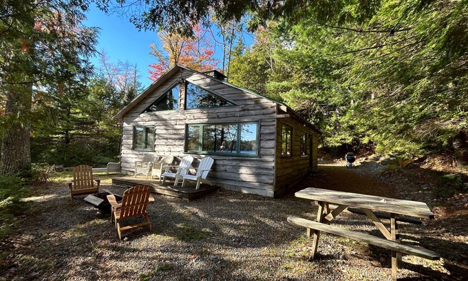 Otis Cabin | Welcoming 4-bedroom lake front cabin in charming Otis on Beech Hill Pond.