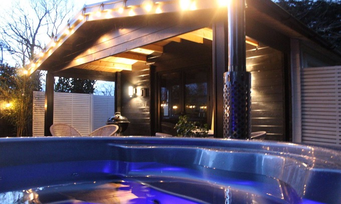 Chwilog Cabin | White River Retreats Log Cabin with Wood Fired Hot Tub