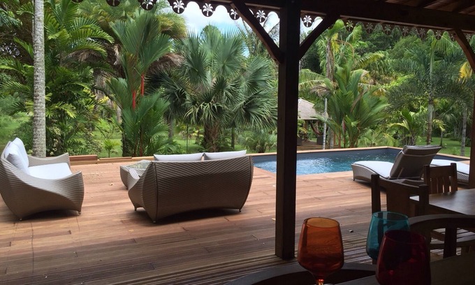 Riviere-Pilote Villa | Wodyetia villa is named after one of the palm trees you will find in the garden