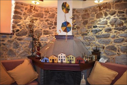 Eresos-Antissa House | wood and stone in the path of lava