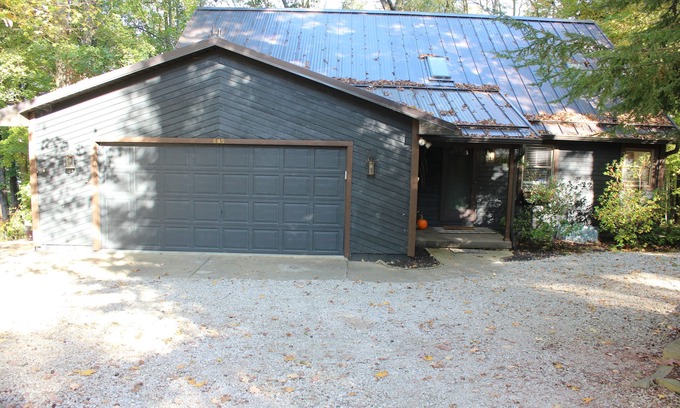 Howard House | Wooded, Lakefront home in Apple Valley