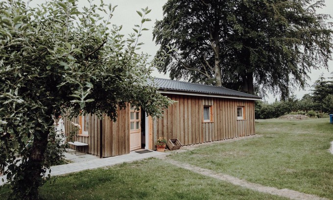 Am Dobrock House | Wooden house in the countryside with fireplace - Lytte Hytte | Holiday house Wingst