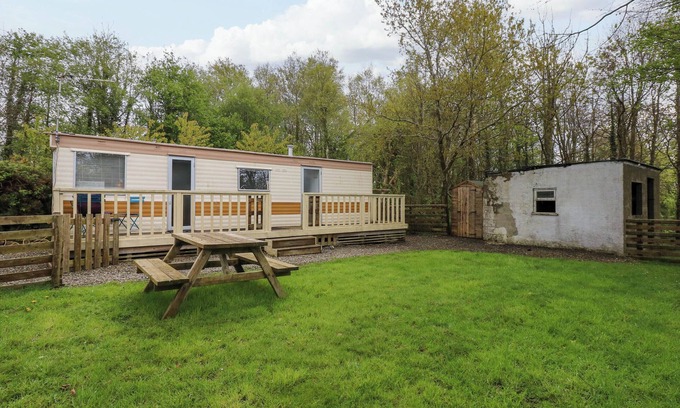 Rhyd-y-clafdy Cottage | WOODLAND CARAVAN, pet friendly, with a garden in Y Ffor