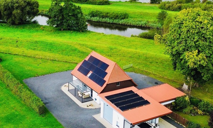 Bremervoerde House | Young dyke house Idyllically situated on the Oste with a view of Lake Vörder