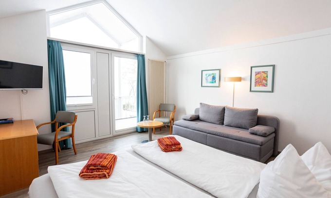 Lubmin House | Zimmer Stammhaus seitlicher Meerblick - Hotel Seebrücke