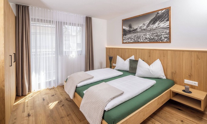 Lutago Apartment | 'Zum Sonnentor - Apartment Larix 2' with Mountain View, Balcony & Wi-Fi