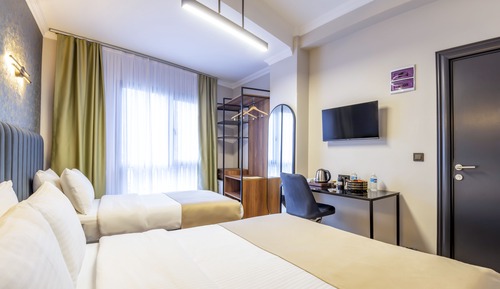 Deluxe Triple Room