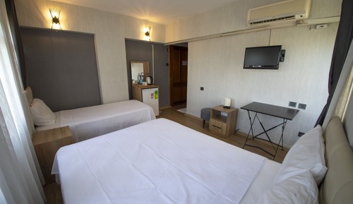 Basic Triple Room, 3 Twin Beds, Balcony, City View