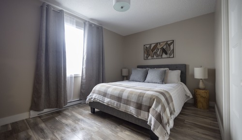 Appartement de deux chambres a coucher + divan-lit