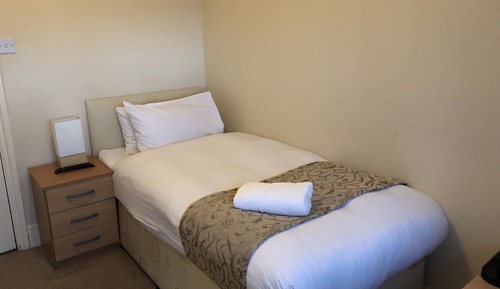 Single Room, Shared Bathroom