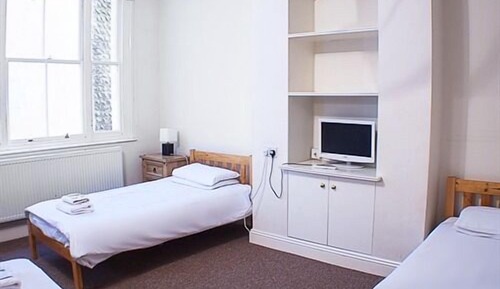 Basic Twin Room,Lower Ground Floor, Shower in room and shared toilet