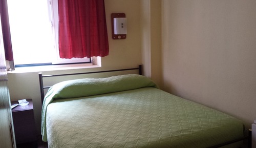 Basic Single Room, Shared Bathroom