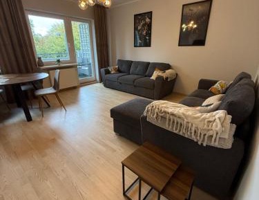 Three-Bedroom Apartment with Balcony