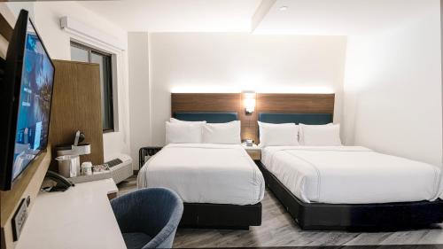 Premium Room with One Queen Bed and One Full Bed
