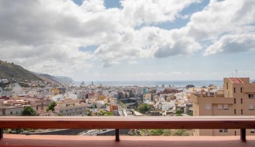 Four-Bedroom Apartment with Balcony 
