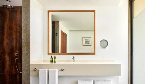 Three-Bedroom Suite with Balcony and Pool View