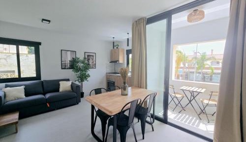One-Bedroom Apartment with Balcony and City View