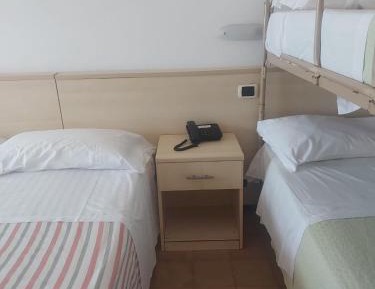 Quadruple Room with Private Bathroom