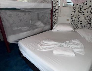 Economy Quadruple Room with Shared Bathroom