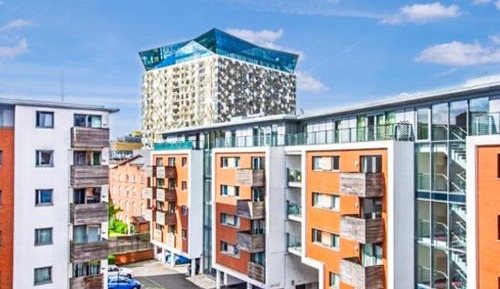 One-Bedroom Apartment with Balcony and City View