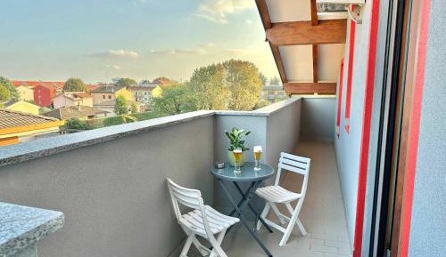 One-Bedroom Apartment with Balcony and City View