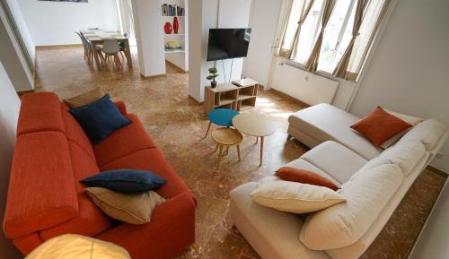 Four-Bedroom Apartment with Balcony 