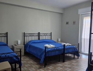 Quadruple Room with Private Bathroom