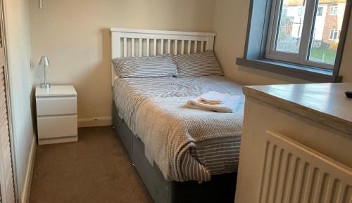 Queen Room with Shared Bathroom