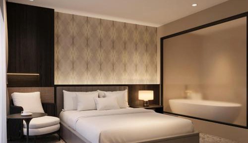 One-Bedroom Apartment with Balcony and City View