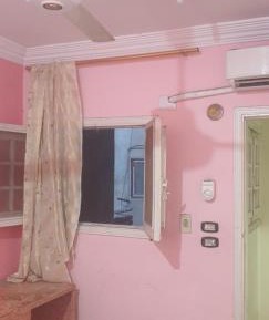 Queen Room with Shared Bathroom