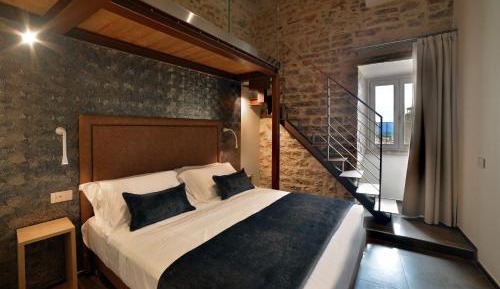 Quadruple Room with Private Bathroom