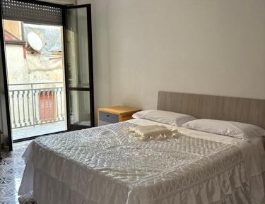 Queen Room with Shared Bathroom