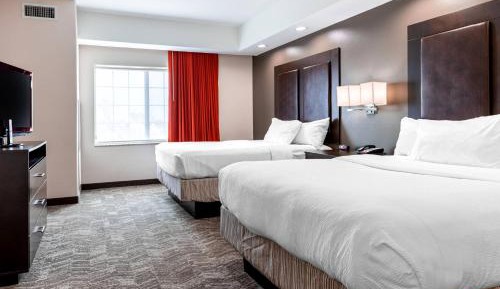 One-Bedroom Suite with Two Queen Beds with Sofa Bed and Roll-In Shower - Mobility and Hearing Accessible