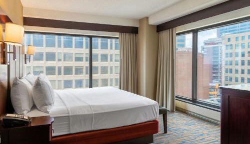 Corner King Suite with Sofa Bed and City View