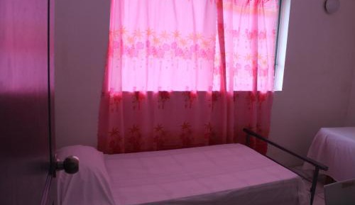 Single Bed in Female Dormitory Room
