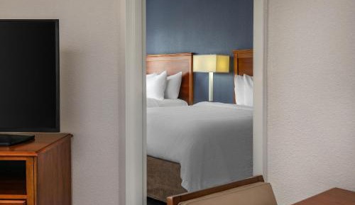 Two-Bedroom Suite with 2 Queen Beds, Sofa Bed, Full Kitchen, Living Space