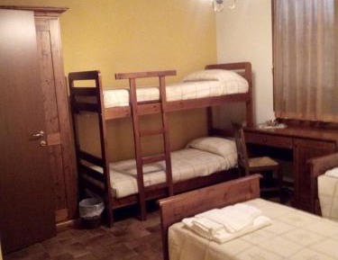 Quadruple Room with Private Bathroom