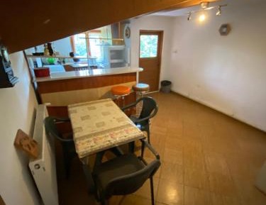 Four-Bedroom Apartment with Balcony 