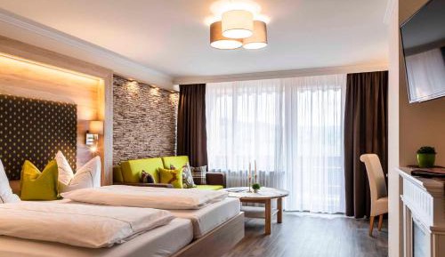 Triple Room with Balcony (2 Adults + 1 Child)