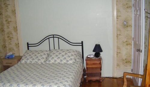 Queen Room with Sofa Bed and Shared Bathroom