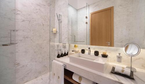 Two-Bedroom Bliss Apartment with Daily Access to Doha Quest for 2 Adults and 2 Kids and QAR 200 credit voucher per night
