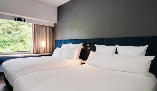 Double Room with Two Double Beds and City View 