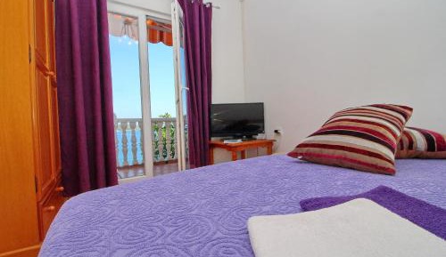 One-Bedroom Apartment with Balcony and Sea View
