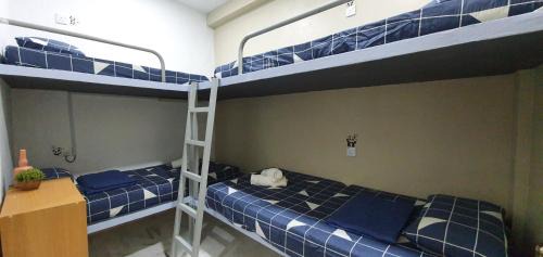 Economy Quadruple Room with Shared Bathroom