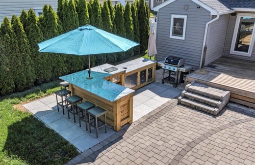Manasquan House | Charming 4 Bedroom House with Pool and tropical backyard Oasis