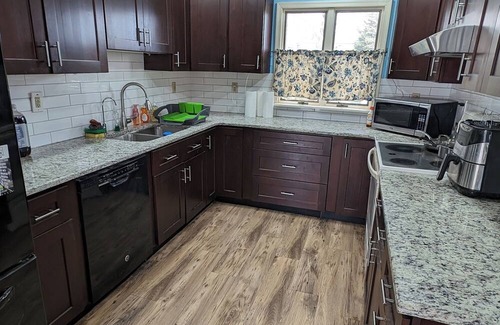 Levittown House | The Hexagon house in the Philadelphia suburbs. Sleeps 9, covered outdoor patio.