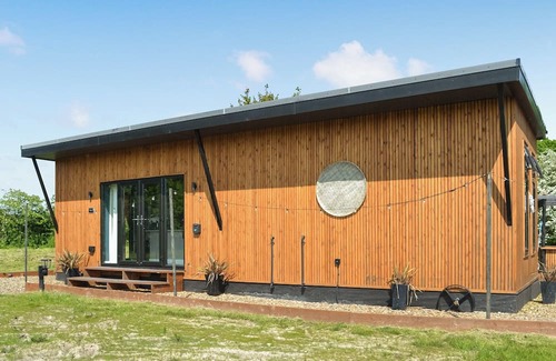Storwood Cottage | We just love the outside entertainment area with a bath for two, table top fire pit and large Smart