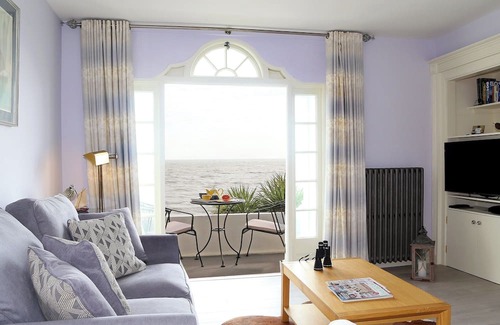Sandgate Cottage | Relax on your balcony and enjoy the stunning, far reaching sea views overlooking Sandgate Bay.